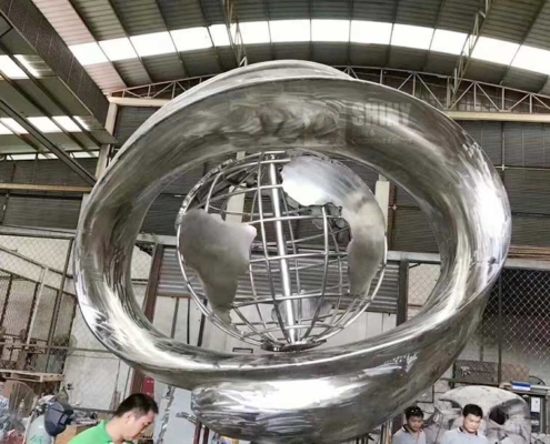 large stainless steel globes sculptures