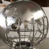 large steel globe