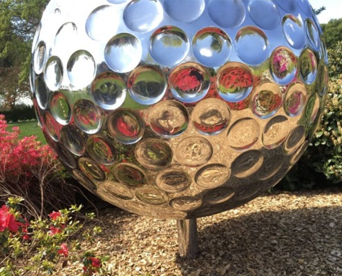 mirror steel golf ball sculpture