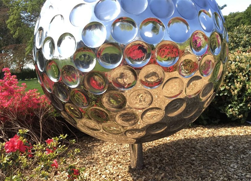 mirror steel golf ball sculpture
